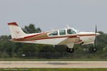N3496A @ KOSH - Beech E33A Bonanza  C/N CE-288, N3496A - by Dariusz Jezewski www.FotoDj.com