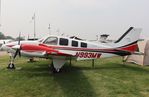 N993MW @ KOSH - Beech G58 - by Mark Pasqualino