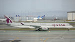 A7-ANM @ KSFO - Sky Terrace SFO 2021. - by Clayton Eddy