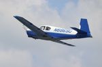 N6869U @ KOSH - Mooney M20C - by Mark Pasqualino