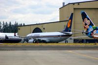 EI-DIM @ KPAE - At Paine Field Snohomish County Airport, KPAE, 2005, Parked next to
The Alaska Disney. - by Tom Vance