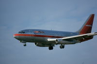 N321AU @ YYZ - Landing on runway 23 at YYZ - by ALASTAIR GRAY
