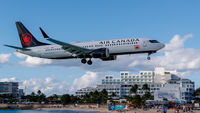 C-FSLU @ TNCM - Maho beach - by martial Dekker