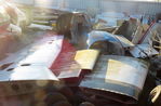 G-BSJU @ EGMT - Wing parts seem to be all that remains of the 150M in the wrecks at Thurrock Airfield - by Chris Holtby