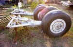 5N-83H - Near Faro Portugal 3.9.1987. Main Landing Gear - by leo larsen