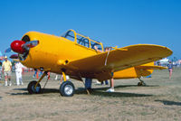 N794E @ OSH - Vultee BT-13 outer wing panels, portions of a Fairchild PT-26 canopy, and a lot of imagineering in between... Oshkosh Airventure '88. - by Gerry Asher