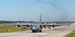 87-9281 @ KPSM - Niagara Herc taxi's up as the Buff departs in the distance - by Topgunphotography