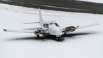 N1402T @ ENBR - Just a sad sight.. Was parked operational at Flesland in 2002 and is now very well beyond repair. Full of corrosion and will never fly again. Still somewhat in one piece with engines and propellers. In use by Avinor fire fighters as a training airframe.