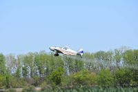 N6542Z - Spraying wheat near Spiro Oklahoma - by Chuck Pickern