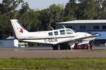 C-GXJW @ KOSH - Beech 58 Baron  C/N TH-815, C-GXJW - by Dariusz Jezewski www.FotoDj.com