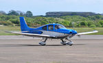G-FPRD @ EGFH - Visiting SR22. - by Roger Winser