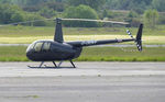 G-DENY @ EGFH - Visiting R44 helicopter. - by Roger Winser