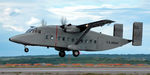 94-0308 @ KOQU - Sherpa taking off with jump team - by Topgunphotography
