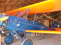N561M - Sideview of the airplane - by Charlotte Frew