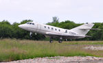 C-GZOX @ EGFH - Visiting bizjet departing Runway 22 to Shannon Airport. - by Roger Winser