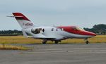 F-HOND @ EGHH - Returning from engine running - by John Coates