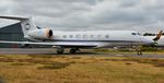 M-AMBA @ EGHH - About to leave Thurston Aviation - by John Coates