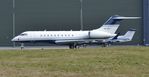 VP-CYJ @ EGHH - Parked at Gama Aviation - by John Coates