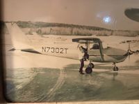 N7302T @ KELO - My dad (Mike Weinzierl) owned this airplane around 1968 when the photo was taken. I was approximately 3-4 years old, and my grandmother (Mary Pechaver) was holding me as we de-planed from the ice runway on Shagawa lake at Wilderness Wings. - by Dianne Weinzierl