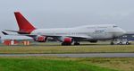 VQ-BZV @ EGHH - Being towed to  apron on arrival - by John Coates