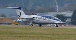 RA-01551 @ EGHH - Arriving on runway 26 - by John Coates