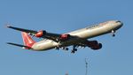 G-ECLB @ EGHH - On approach to 08 - by John Coates