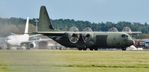 ZH867 @ EGHH - Arriving runway 26 - by John Coates