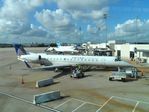 N13124 @ IAH - At the gate at IAH - by Arthur Tanyel