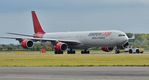 9H-NHS @ EGHH - Being towed onto runway for engine start - by John Coates