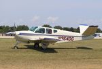 N354DG @ KOSH - Beech J35