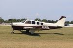 N1912L @ KOSH - Beech A36 - by Mark Pasqualino
