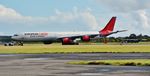 9H-NHS @ EGHH - Being towed to runway 26 - by John Coates