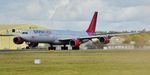 9H-NHS @ EGHH - Rotates from runway 26 - by John Coates