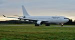 9H-JFS @ EGHH - Arriving on runway 26 - by John Coates