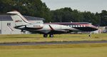 N700YB @ EGHH - Backtracking on arrival - by John Coates