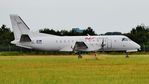 YL-RAG @ EGHH - Taxiing to depart - by John Coates