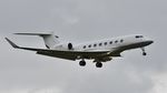 A7-CGD @ EGHH - On approach to 08 - by John Coates