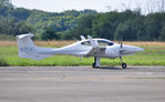 N35AL @ EGFH - Visiting Twin Star. - by Roger Winser