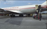 N373WA - Passengers disembarking, circa 1970 - by John Davidson