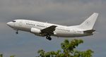 N2106A @ EGHH - Departing on delivery to China - by John Coates