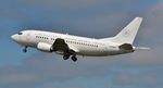 N2106A @ EGHH - Departing on delivery to China - by John Coates