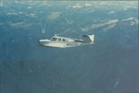 N5413U - In flight over Alaska panhandle - by Cal Simmons