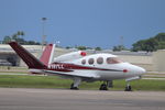 N197LL @ KFMY - Cirrus Vision parked on the Base Ops ramp at Page Field - by Donten Photography