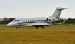 G-JSNS @ EGHH - Taxiing on arrival - by John Coates