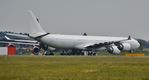 9H-EAD @ EGHH - At Cargo parking - by John Coates