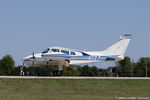 N137 @ KOSH - Cessna 310F  C/N 310-0028, N137 - by Dariusz Jezewski www.FotoDj.com