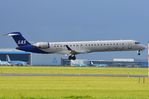 ES-ACG @ EHAM - SAS CL900 landing - by FerryPNL