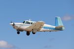 N9789M @ KOSH - Mooney M20F - by Mark Pasqualino