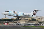 LV-JVB @ LMML - Bombardier Challenger 601-3A LV-JVB with Diego Maradona picture. - by Raymond Zammit