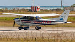 6Y-JCF @ MKJS - Waiting for clearance to enter Runway 07 for Local flight. - by Steve Smith